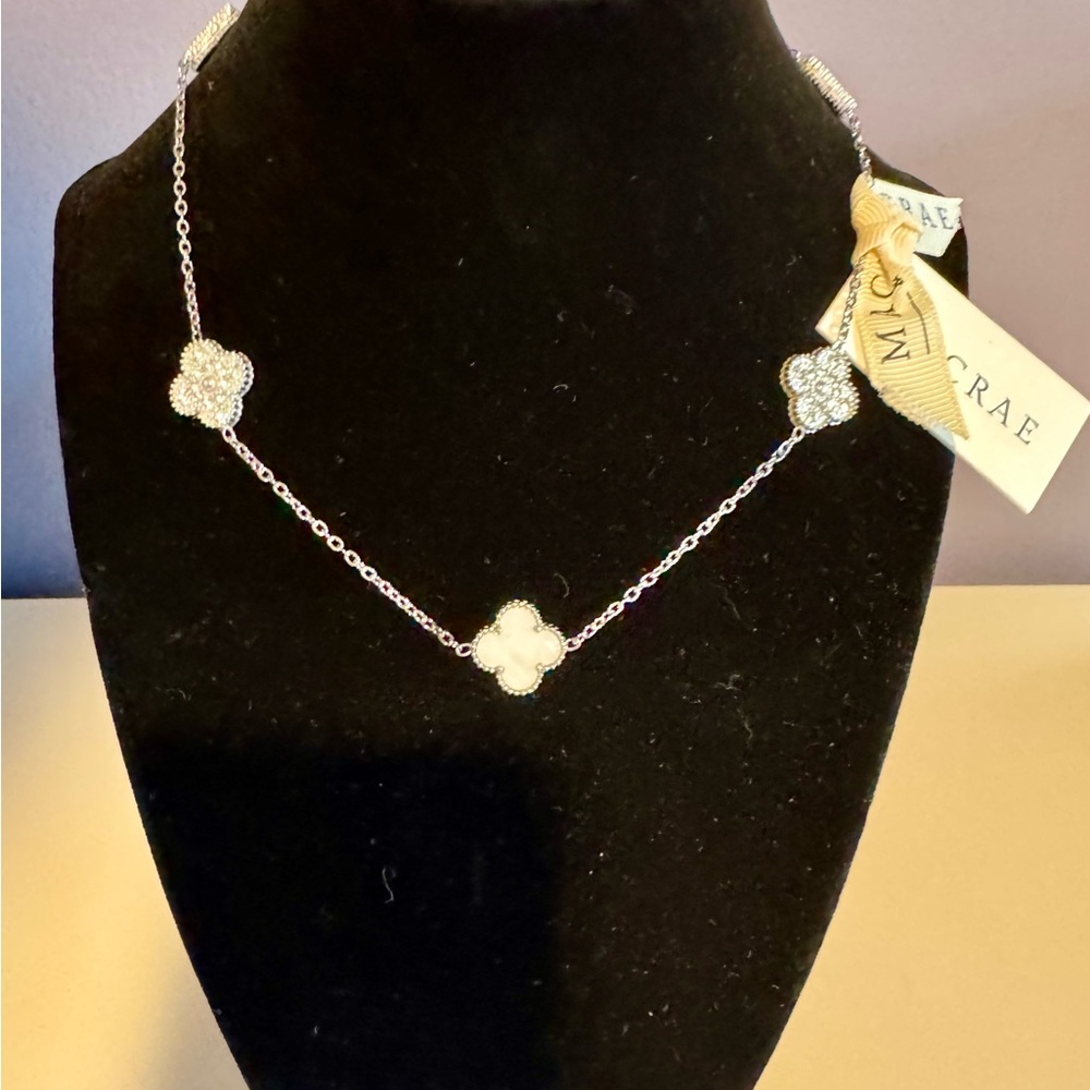 Elegant Silver Necklace with Floral Accents in both White and Silver Tone